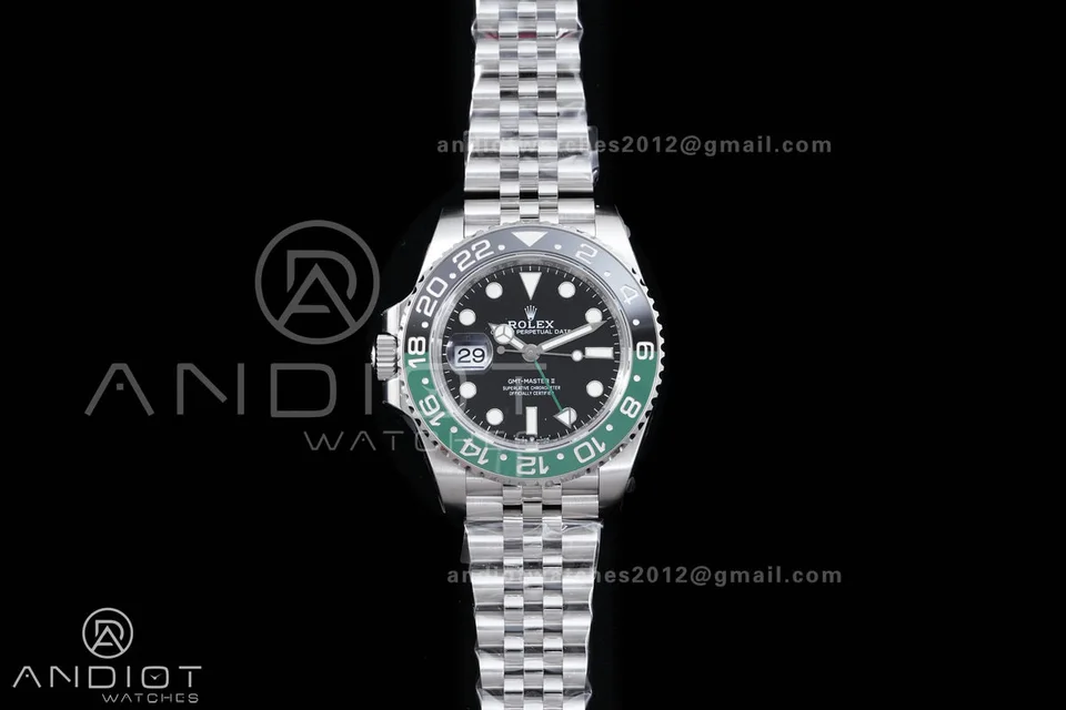 Rolex GMT-Master II · Green / Black Left Crown